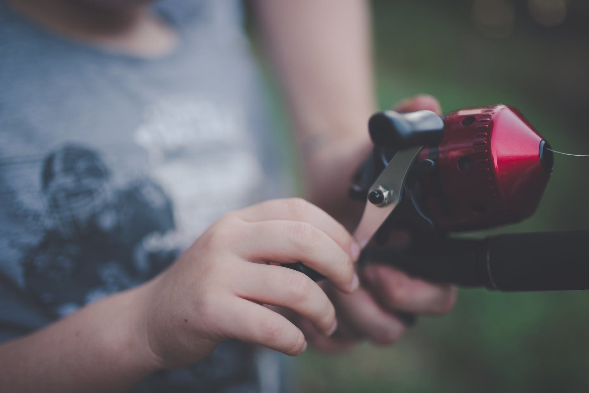 person holding a fishing rod