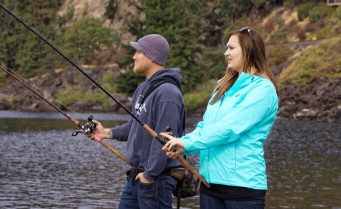 man and woman fishing